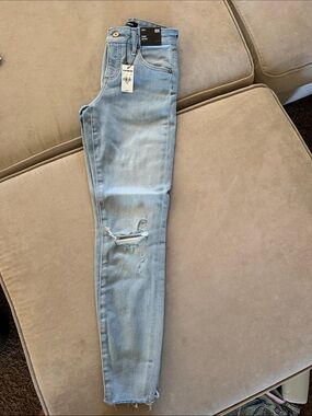 Express Light Wash Women's Skinny Jeans with Knee Distress